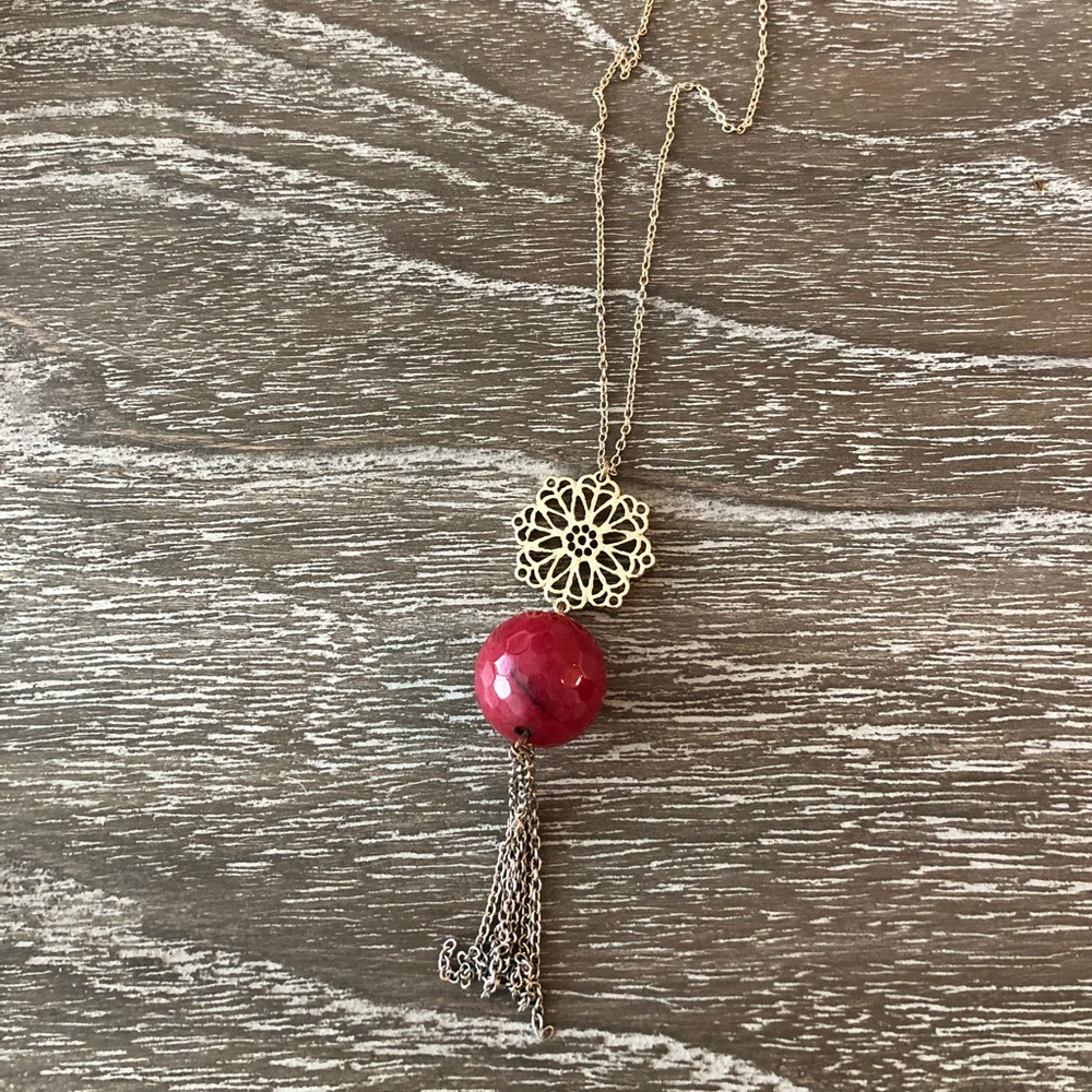 Red and gold necklace with tassel
